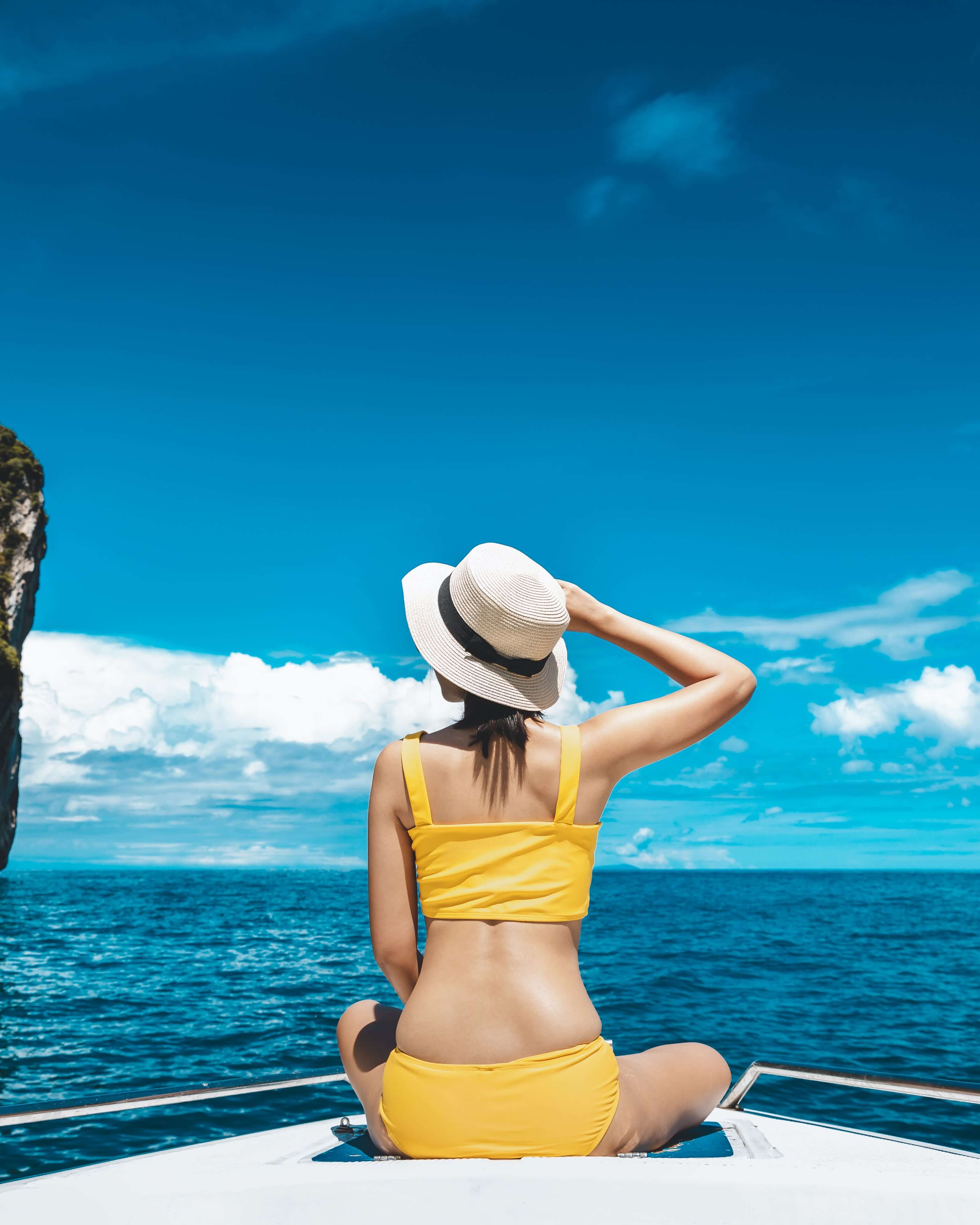 Girl with bikini in a boat in Halkidiki Greece